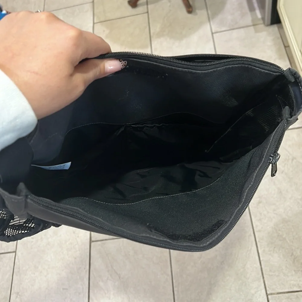 Skip hop diaper bag caddy with many compartments and changing pad